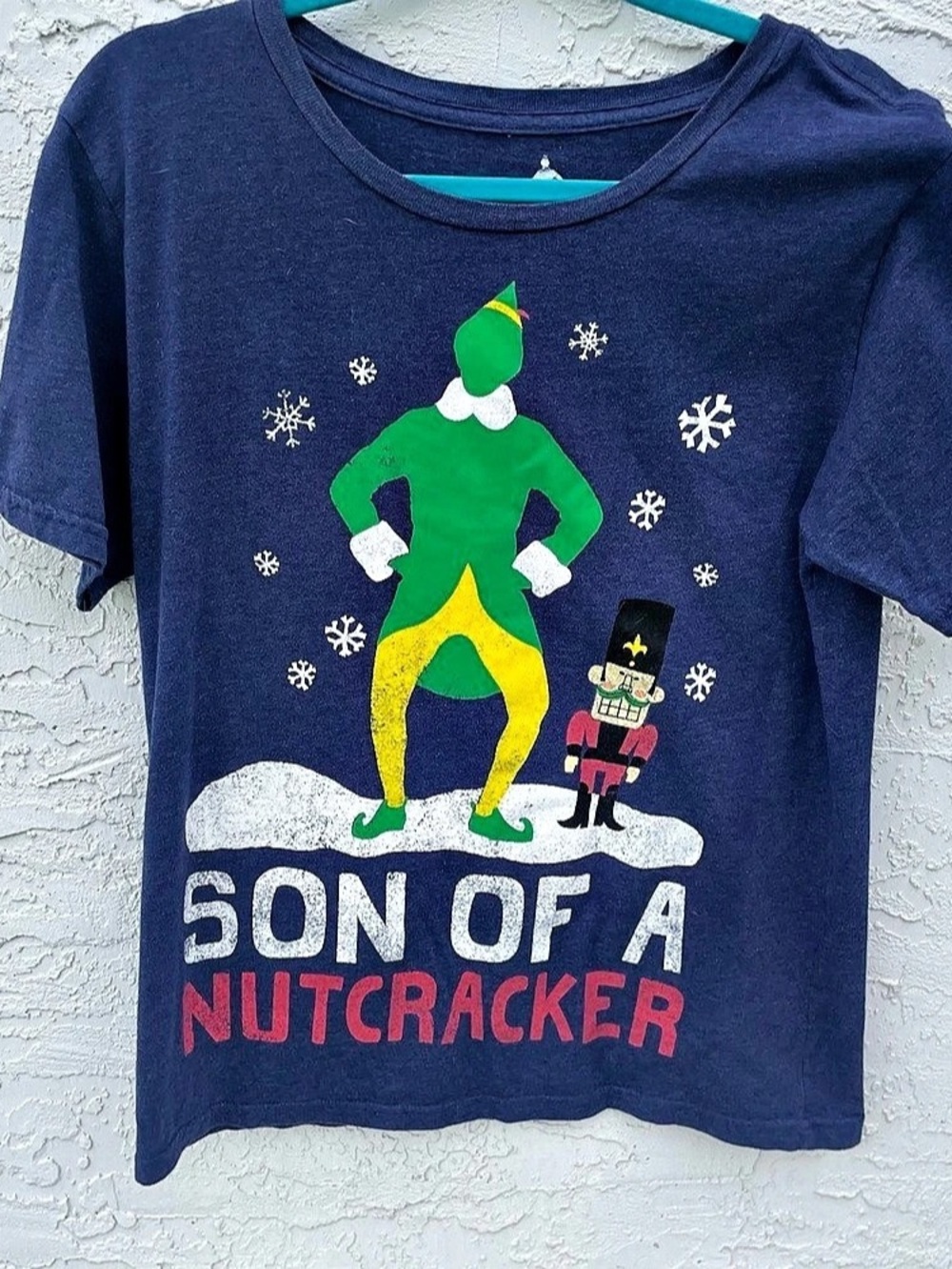 e.l.f. Son of a Nutcracker. Graphic Tee Blue XL